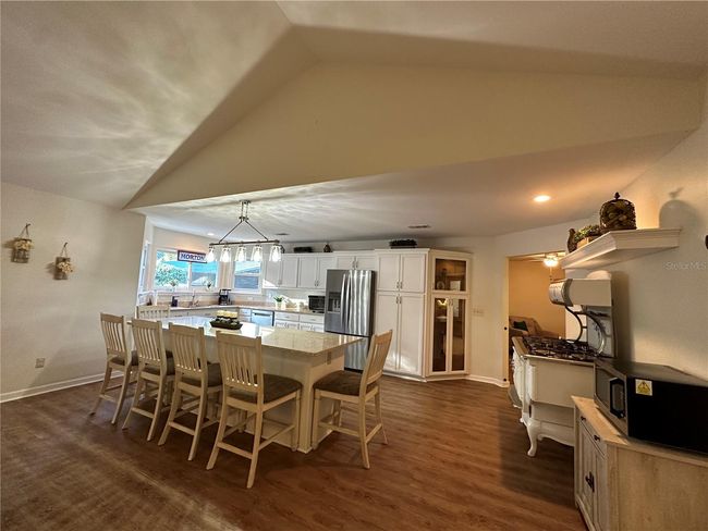 QUARTZ COUNTERTOPSStainless Steel Appliances & Built In Wood Curio with Lights | Image 9