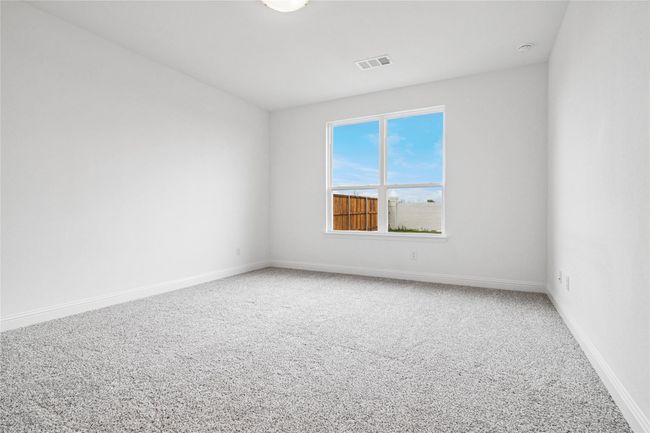 Carpeted empty room with baseboards | Image 21