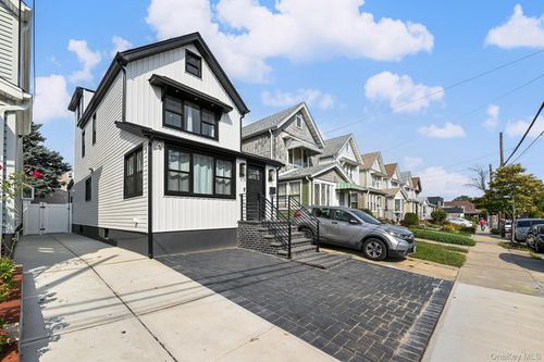 91 71st Ave, Forest Hills, NY, 11375-6704 | Card Image