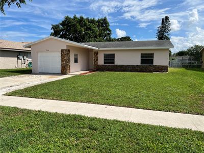 7614 Sw 8th Ct, House other with 3 bedrooms, 2 bathrooms and null parking in North Lauderdale FL | Image 2