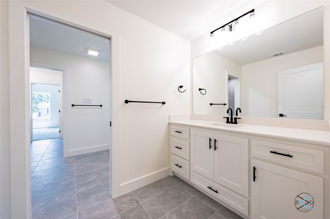 Bathroom featuring vanity | Image 13