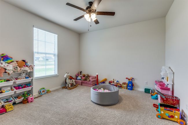 Playroom featuring carpet floors and ceiling fan | Image 13