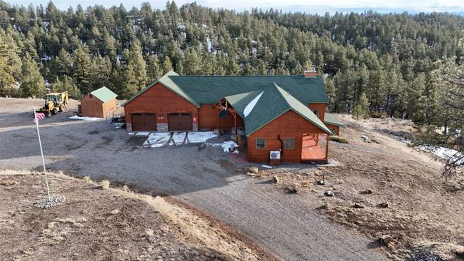 Bird's eye view featuring a forest view | Image 20