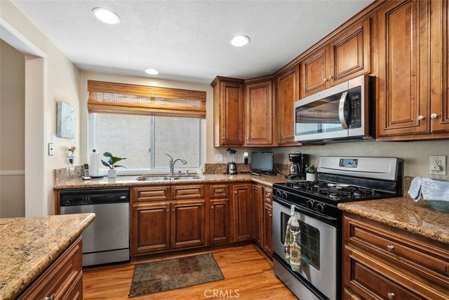 This kitchen has great cabinet and counter space | Image 17