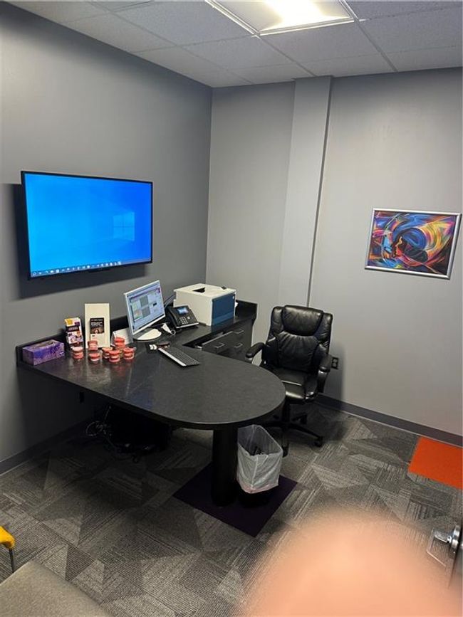 Office area with carpet flooring and a drop ceiling | Image 28
