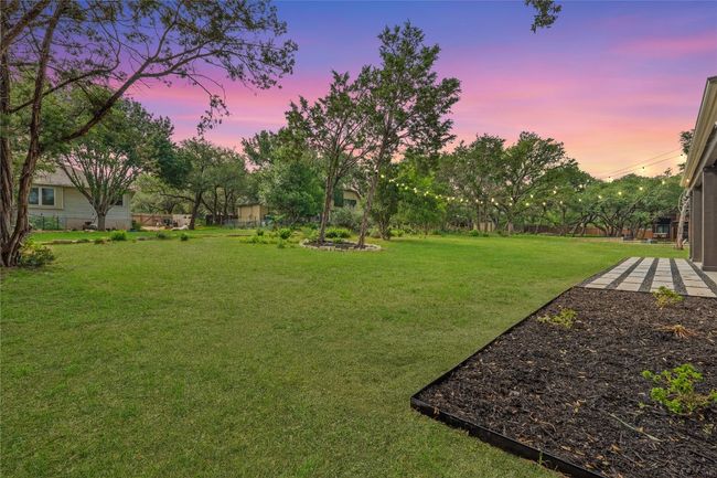 Yard at dusk featuring a yard | Image 33