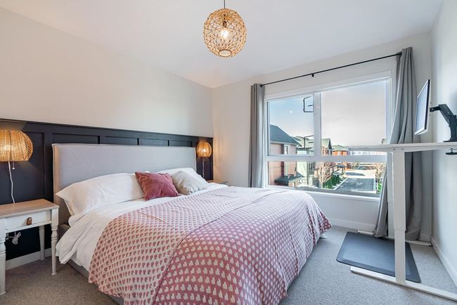 Bedroom featuring baseboards and carpet floors | Image 18