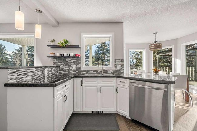 917 East Lakeview Road, Home with 6 bedrooms, 3 bathrooms and 10 parking in Chestermere AB | Image 9