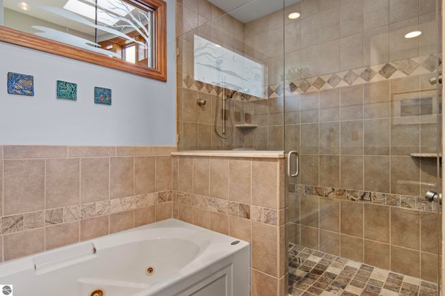 4173 Dornoch Ct, House other with 6 bedrooms, 4 bathrooms and null parking in Williamsburg MI | Image 52
