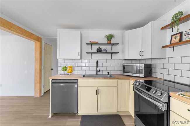 The Kitchen has newer butcher block counters | Image 5