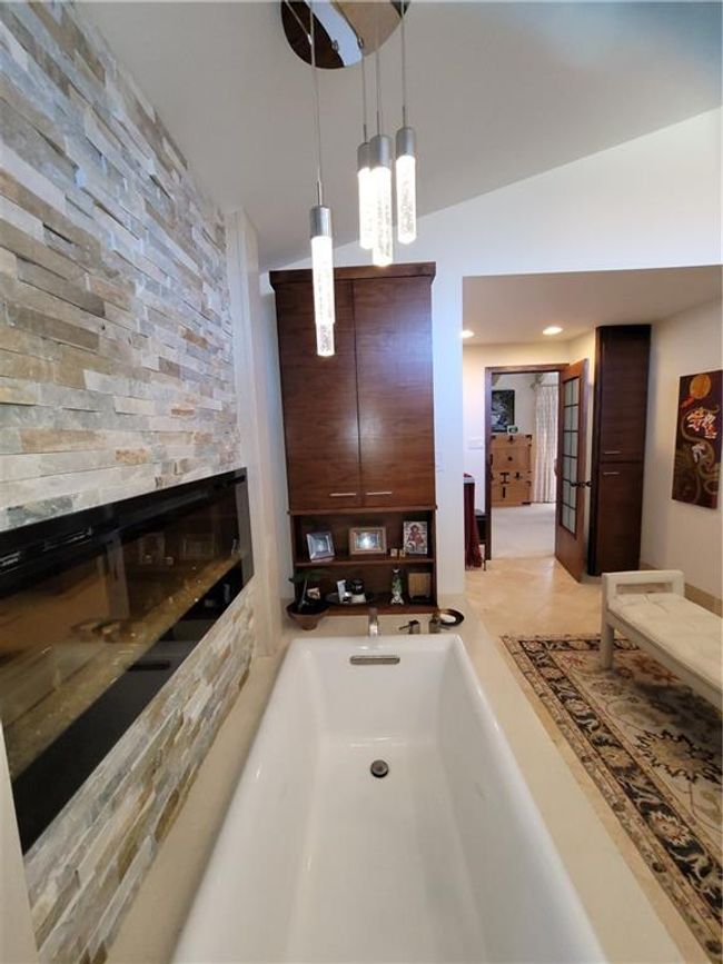 Bathroom with a tub to relax in | Image 32