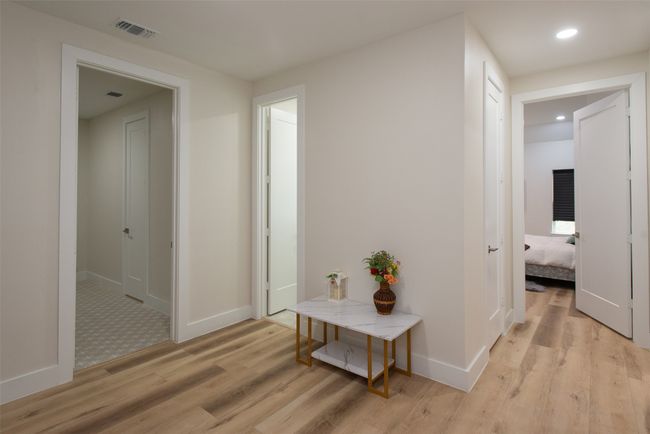 Corridor featuring light wood-type flooring | Image 29