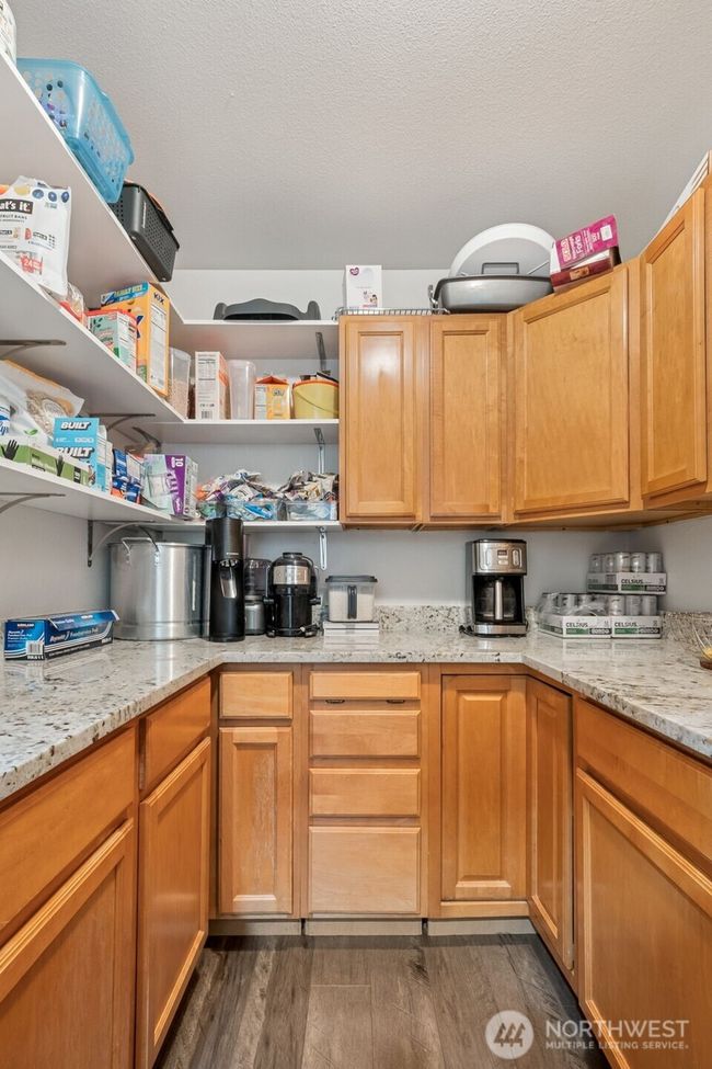 Walk-in pantry with ample cabinets and countertop - Espresso or juice bar | Image 11