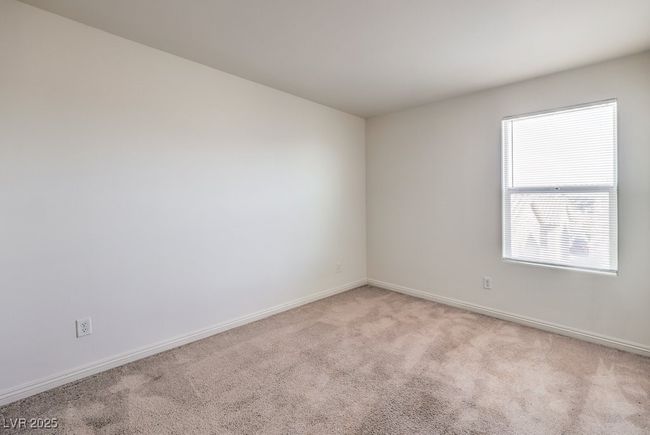Unfurnished room featuring baseboards and light colored carpet | Image 25