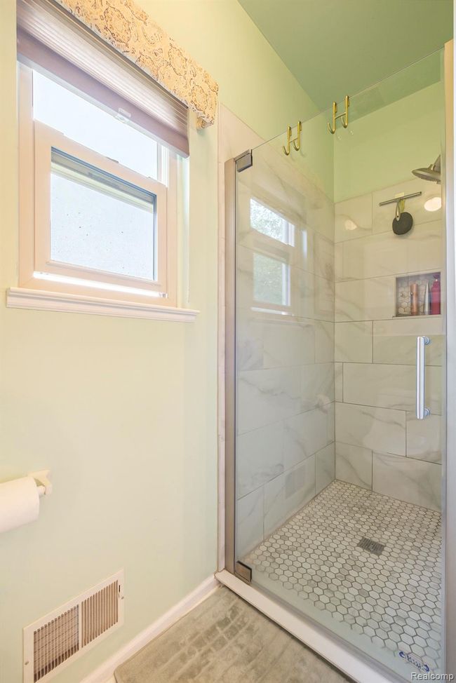 Glass doored shower in primary bathroom | Image 11