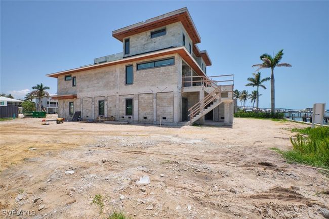 Back of property with stairway and a deck | Image 7