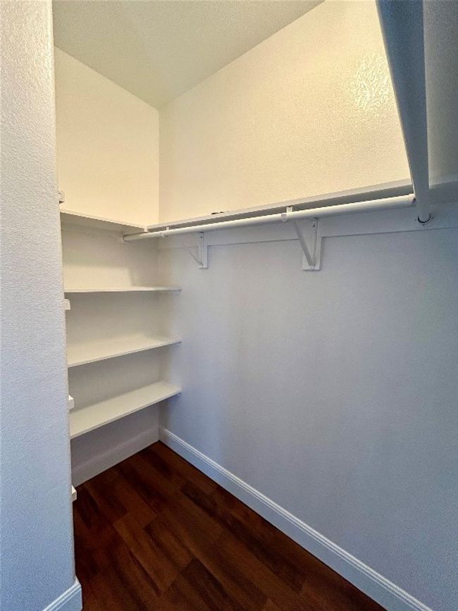 Primary bedroom walk-in closet | Image 18