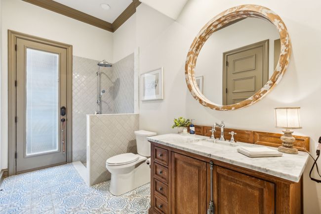 The Pool Bath Showcases Designer Tile Work and a Stylish Walk-In Shower | Image 21
