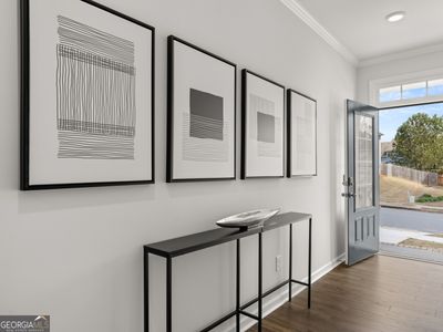 Hanover front entryway with long foyer with hardwood-like flooring | Image 2