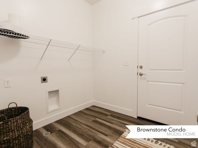 Clothes washing area with electric dryer hookup, baseboards, dark wood-style floors, and laundry area | Image 10