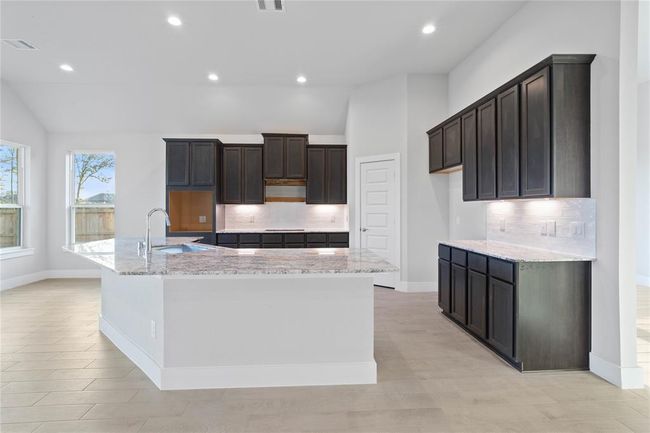 This photo is for illustrative purposes only and is not to be considered an exact replica of the finished home. Rendering does not match the finished product in terms of features, colors, landscaping, etc. Pricing, specifications, square footage and materials are subject to change at any time and without notice. | Image 9