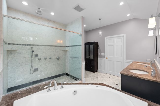 The primary bathroom has a walk-in shower. | Image 24