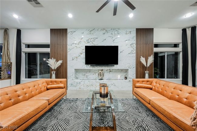 Living area with visible vents, ceiling fan, and recessed lighting | Image 20