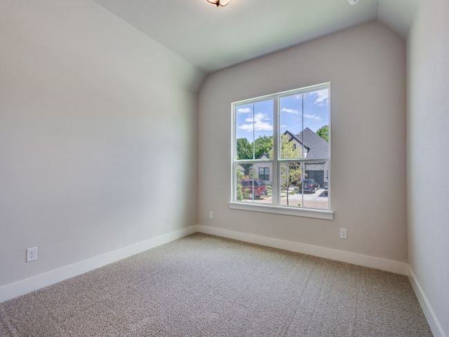 You'll find three nicely sized secondary bedrooms each with en suite bath in this fantastic home. | Image 15