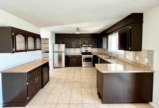 9119 95 Avenue, Home with 5 bedrooms, 2 bathrooms and 4 parking in Lac La Biche AB | Image 5