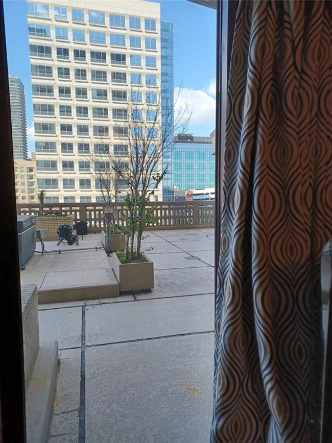 Standing with the sliding door at your back and looking out toward the hallway. | Image 21