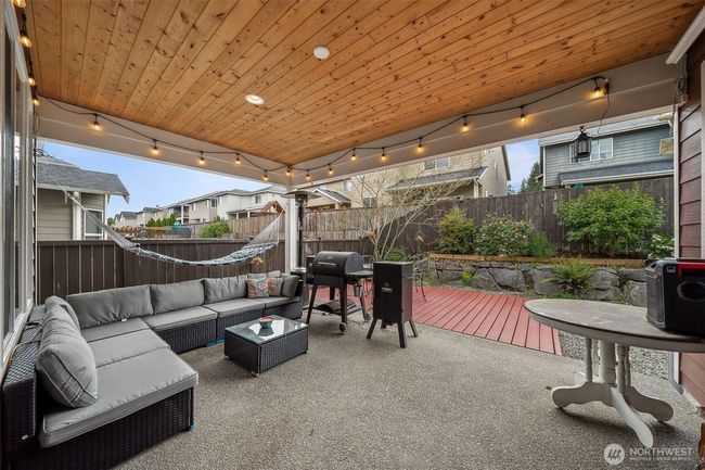 LARGE covered back patio area with tongue & groove ceiling to enjoy year round! | Image 10