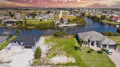 Aerial view at dusk with a water view | Image 1