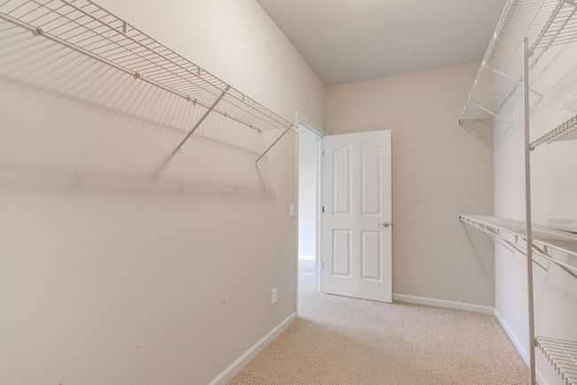 primary bedroom walkin closet | Image 27