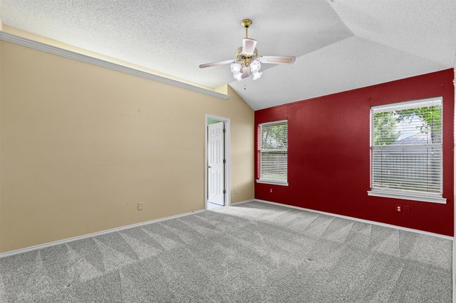 The primary ensuite is a true retreat, offering a garden tub, walk-in shower, double vanities and spacious his-and-hers walk in closets. | Image 13
