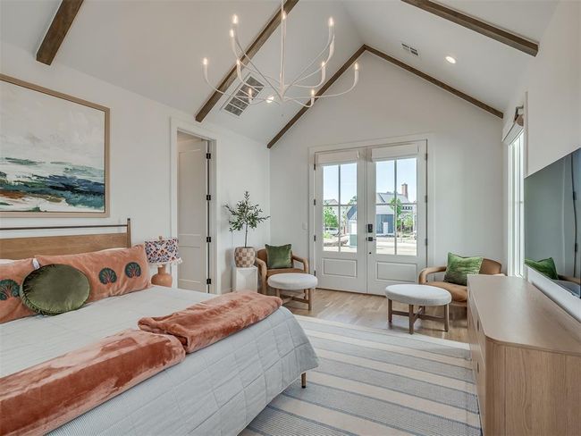 Bedroom with access to exterior, a chandelier, light wood finished floors, french doors, and recessed lighting | Image 21