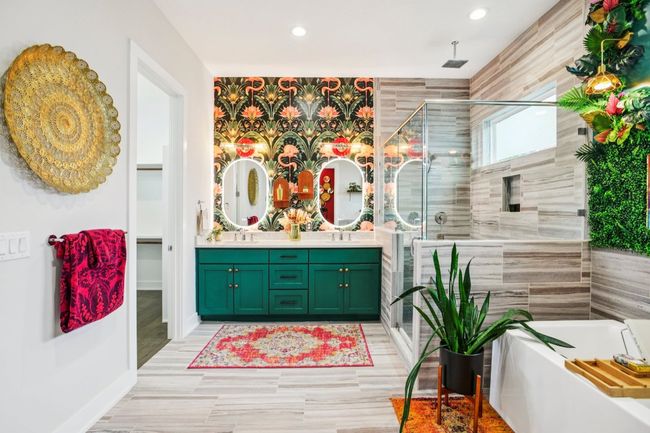 Full bathroom featuring a stall shower, double vanity, a tub to relax in, and recessed lighting | Image 21