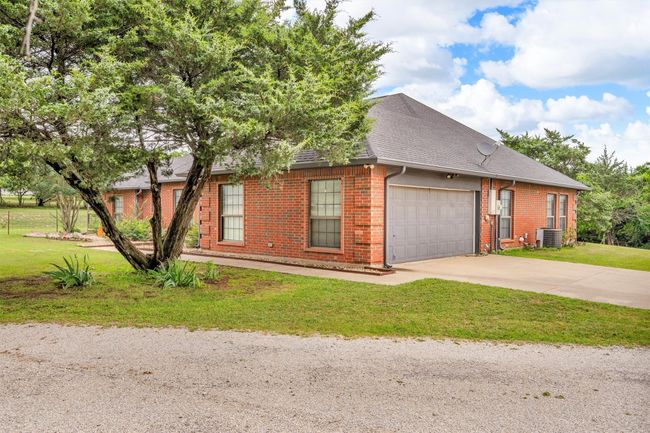 2 car attached garage with afternoon shade. | Image 5