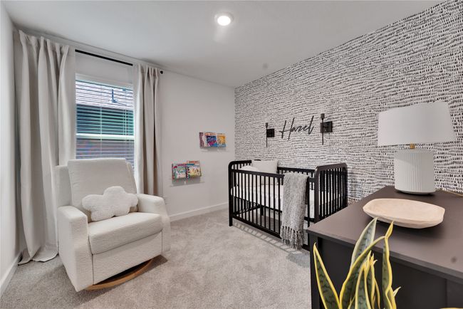 Bedroom with baseboards, an accent wall, carpet floors, a nursery area, and recessed lighting | Image 23