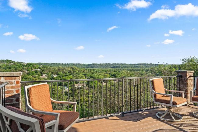 Upstairs deck off of the game room with sweeping views of the greenbelt. This is the place to watch the sunrise! | Image 29