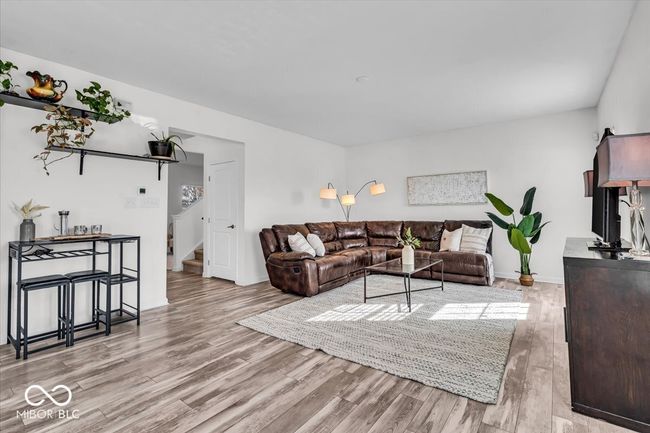 The Family Room, Kitchen and eating area flow seamlessly together. | Image 9