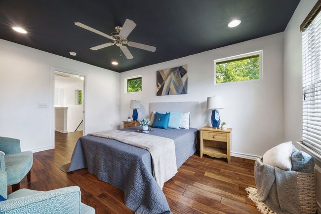 Bedroom with hardwood / wood-style floors, multiple windows, recessed lighting, a ceiling fan, and baseboards | Image 23