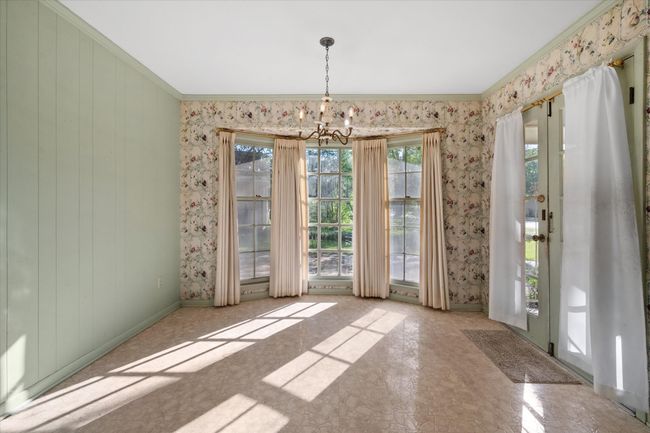 Light and bright breakfast room of of kitchen with wood bay window | Image 18