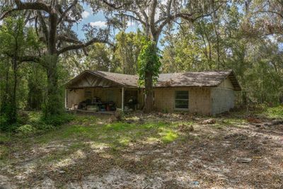 vacant abandoned home on 3 acre lot adjacent to Endsley Rd with road access. | Image 1