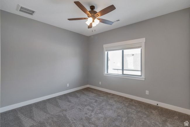 Spare room with carpet floors and a ceiling fan | Image 25