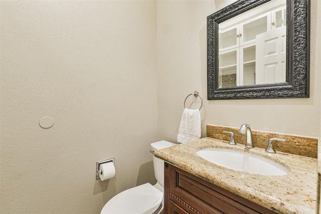 Convenient downstairs half bath for guests. | Image 20