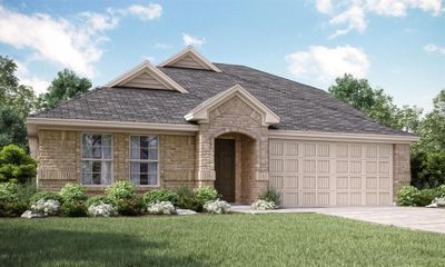 View of front facade with a garage and a front lawn | Image 1