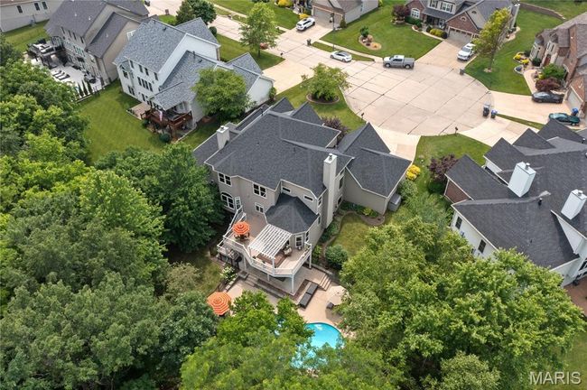 Aerial view of residential area with a pool | Image 4