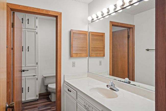 Bathroom featuring vanity and wood finished floors | Image 26