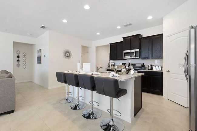 8024 Oak Shadow Ct, House other with 6 bedrooms, 6 bathrooms and null parking in DAVENPORT FL | Image 4