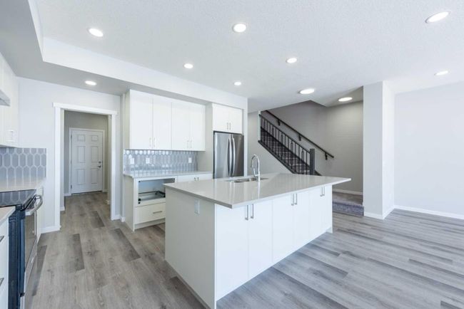 66 Magnolia Court Se, Home with 3 bedrooms, 2 bathrooms and 2 parking in Calgary AB | Image 5
